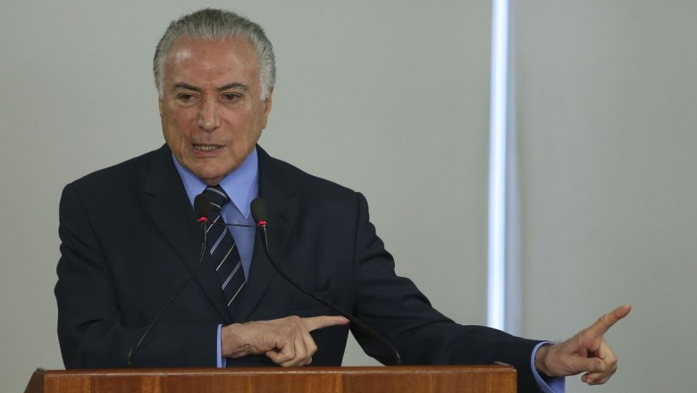 Temer sanciona lei do frete e veta anistia a multas