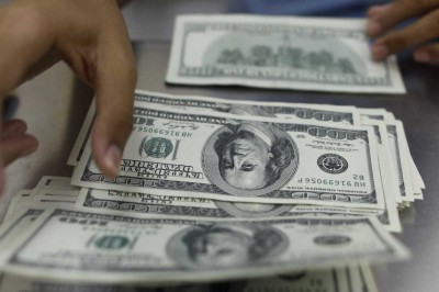 Dólar volta a subir e bate R$ 4,11 nesta terça